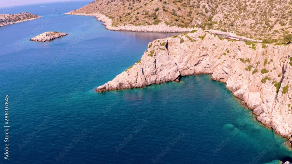 Drone coastal aerial flight past beautiful bays overlooking beaches and turquoise coral reefs. Drone coastal aerial flight past beautiful bays overlooking beaches and turquoise coral reefs.