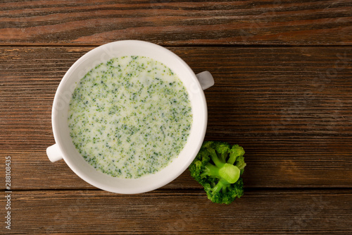 creamy broccoli soup with cheese top view