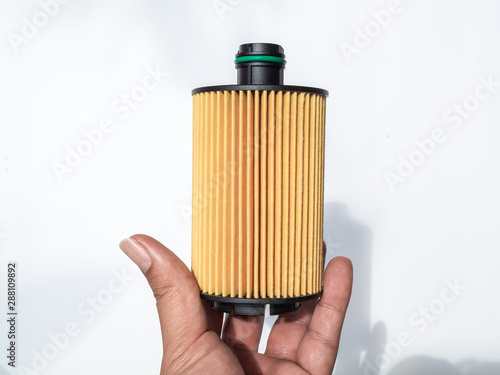 Oil filter. Car fuel filter isolated on white background photo