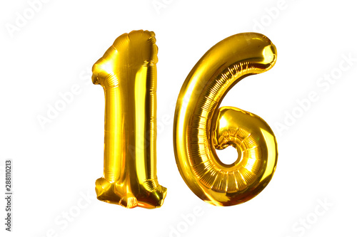 Happy 16 years old party with golden shiny inflatable balloons isolated on white