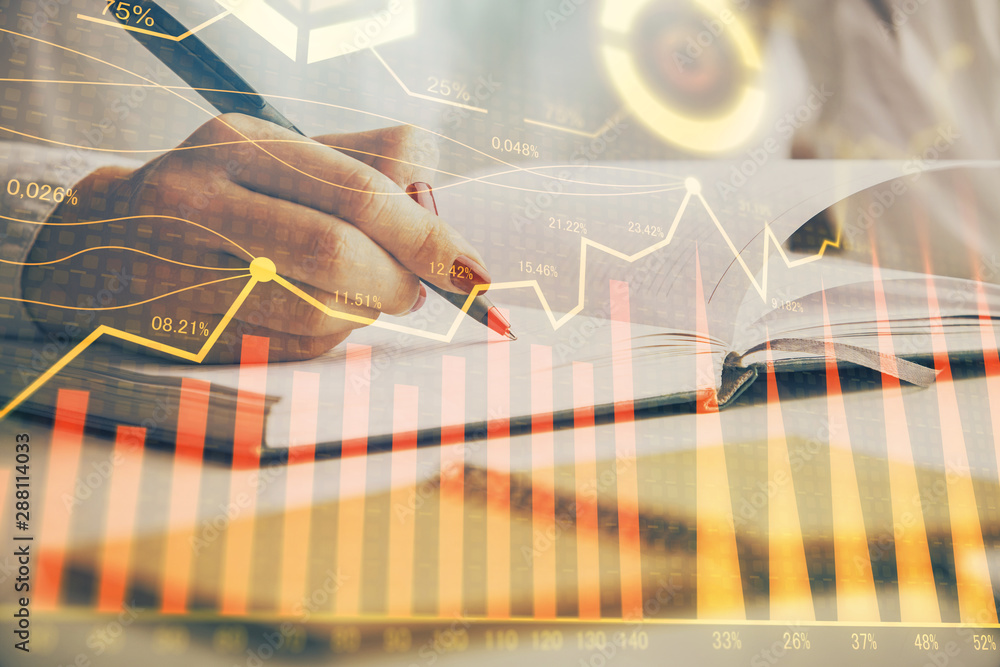 Double exposure of woman's hands making notes with forex graph hologram. Concept stock market analysis. Double exposure of woman's hands making notes with forex graph hologram. Concept stock market analysis.