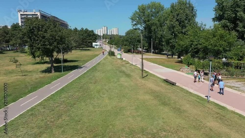 Wallpaper Mural Take off through-the-trees drone shot of Usce park near Hotel Yugoslavia in Belgrade, Serbia Torontodigital.ca