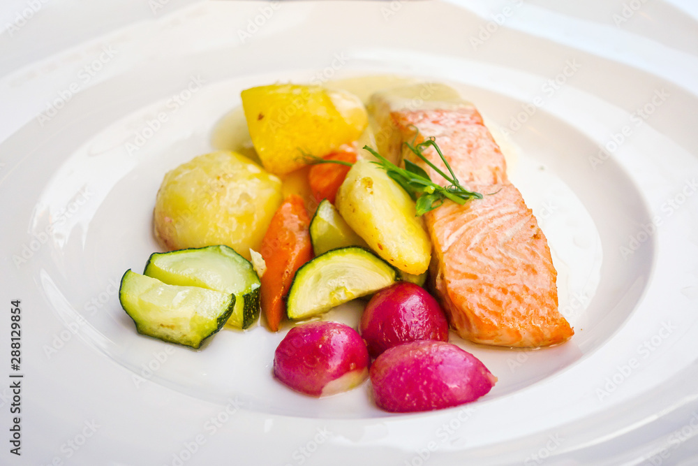 Grilled Salmon with fresh lettuce and mash potatoes Grilled Salmon with fresh lettuce and mash potatoes