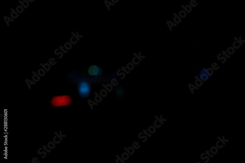 Colored abstract bokeh on black background