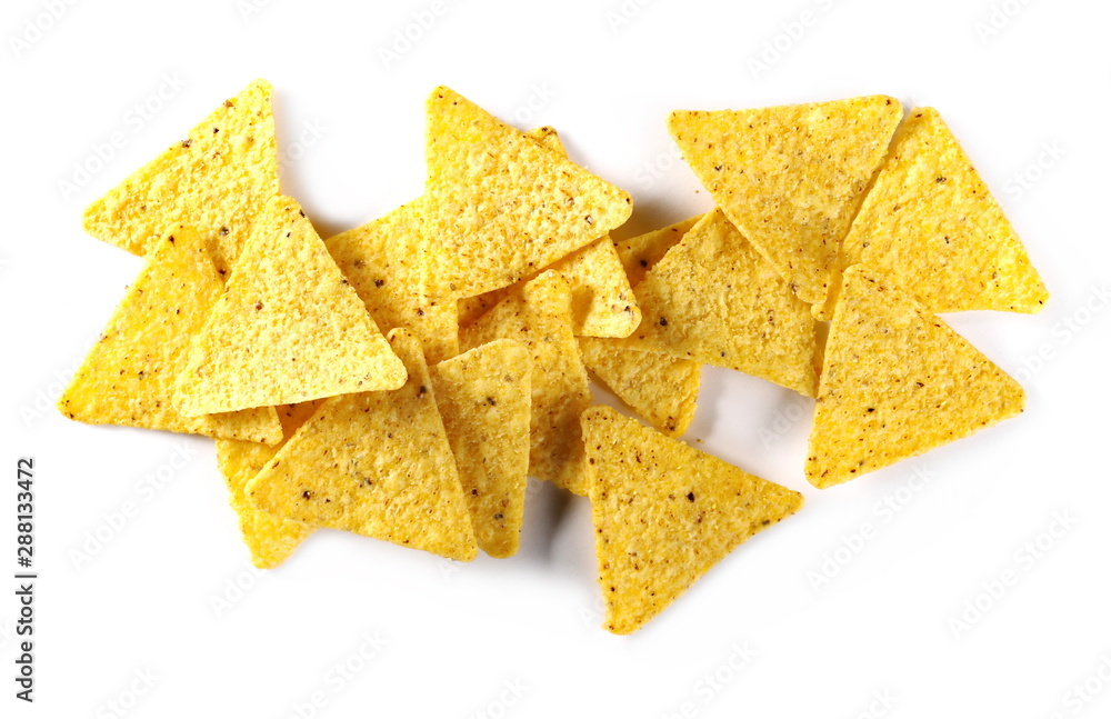 Corn tortilla chips pile, party snacks isolated on white background, top view Corn tortilla chips pile, party snacks isolated on white background, top view