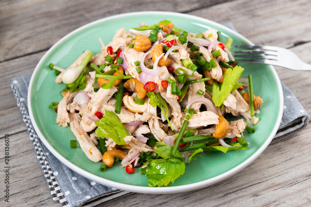 Steamed rip chicken spicy salad with shallot, celery, chili and Scallion.