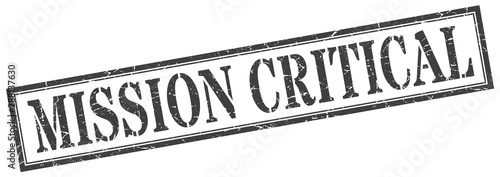mission critical stamp. mission critical square grunge sign. mission critical