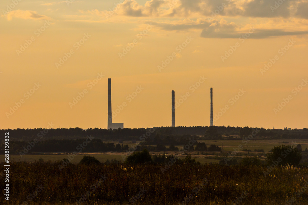 high pipes of Kostroma GRES at sunset high pipes of Kostroma GRES at sunset