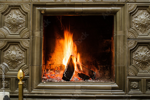 Close up shot of burning firewood in the fireplace