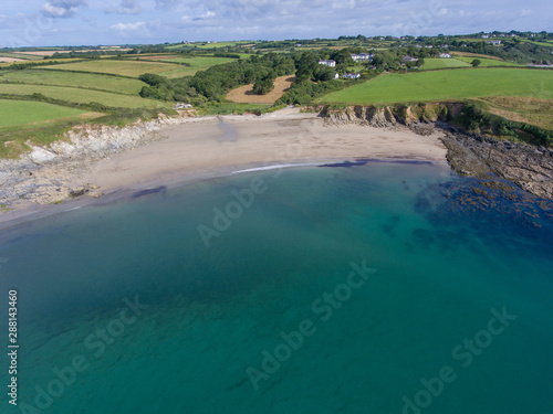 Aerial view Porthcurnick beach bay by drone
