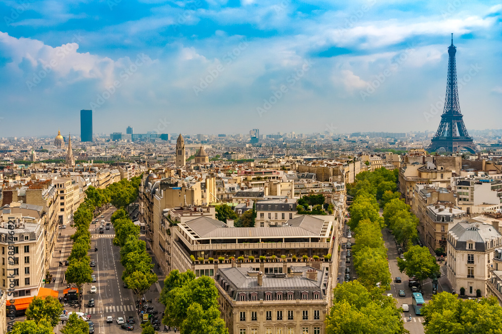 Lovely panoramic aerial view of the Paris cityscape with the famous and iconic Eiffel Tower, the Avenue d'Iéna and the Avenue Marceau on a beautiful sunny summer day with a blue sky.