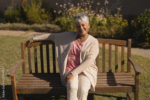 Senior woman sitting on a bench in the park © WavebreakMediaMicro