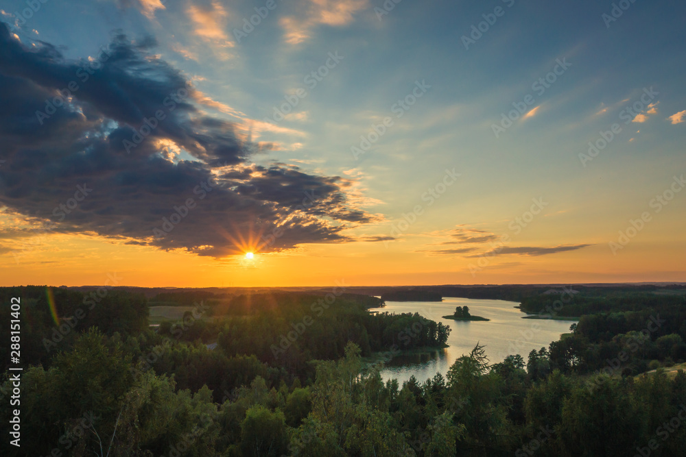 Sunset over the Jedzelewo lake in Stare Juchy, Masuria, Poland