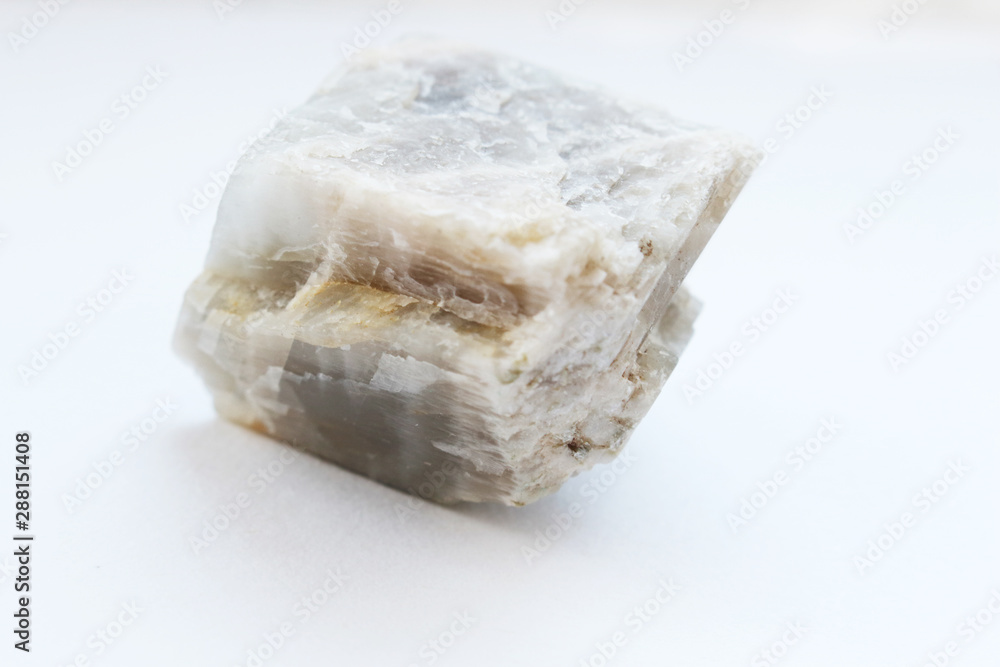 Textured surface moon stone isolated on white background Textured surface moon stone isolated on white background