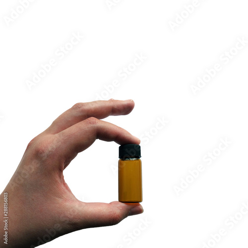 Hand with brown glass bottle on white background, mocap