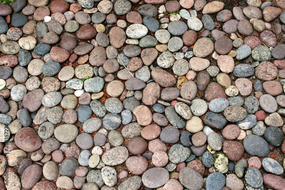 Small oval and round sea shore pebbles Small oval and round sea shore pebbles