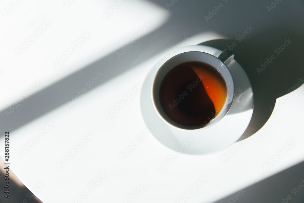 morning tea on a white table. Copy space mockup. Clean, quiet and calm morning morning tea on a white table. Copy space mockup. Clean, quiet and calm morning