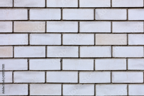 White and gray brick wall texture closeup