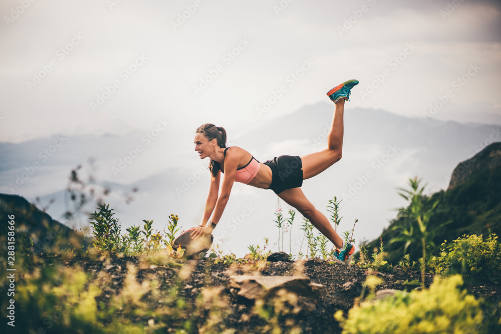 Foto de Fitness woman doing exercises in nature. Girl doing