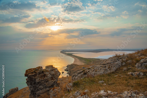 Black Sea and Kayashsky salt lake in the Opuksky reserve in the evening at sunset, Crimea photo