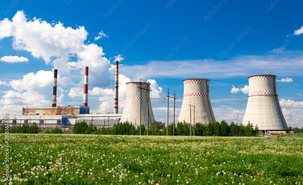 City power plant towers, sunny day. City power plant towers, sunny day.
