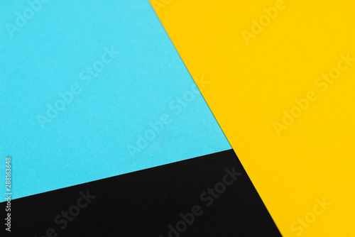 Yellow  blue  black  colored paper background