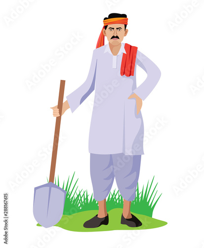 indian farmer standing with shovel