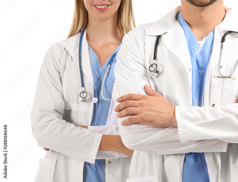 Male and female doctors on white background Male and female doctors on white background