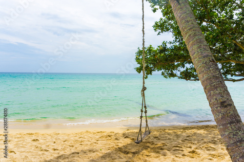 Exotic sea beach tropical island with coconut tree © themorningglory