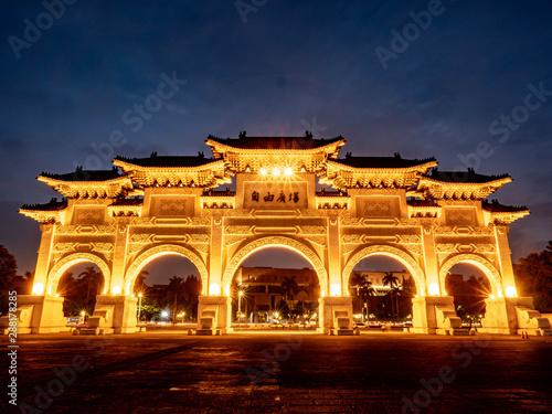 Taipei, Taiwan - May 15, 2019: Arch in front of the Liberty Square (Freedom Square) Main Entrance gate with tourist visiting Chiang Kai-Shek memorial hall in the evening, Taipei Taiwan.