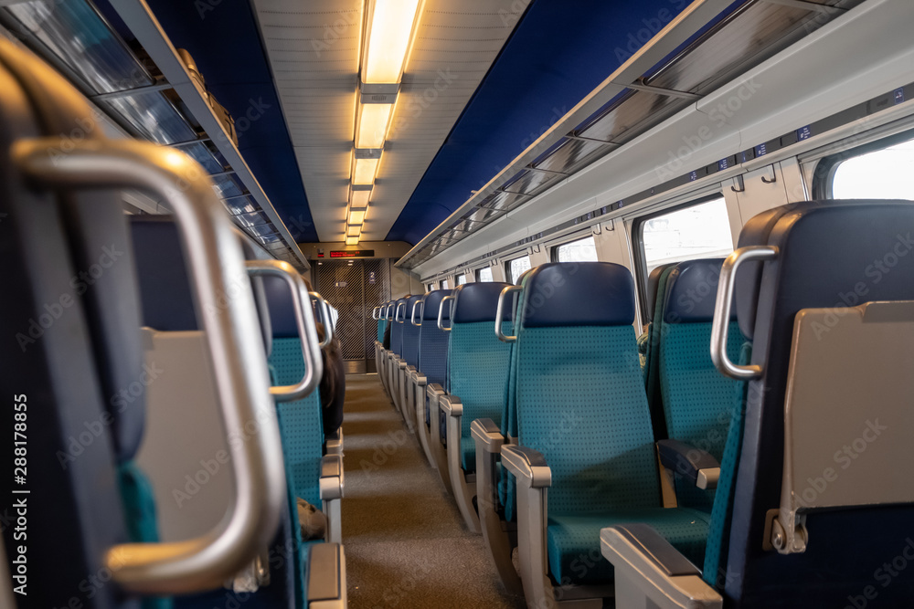 Obraz premium Perspective view of seats in a modern train
