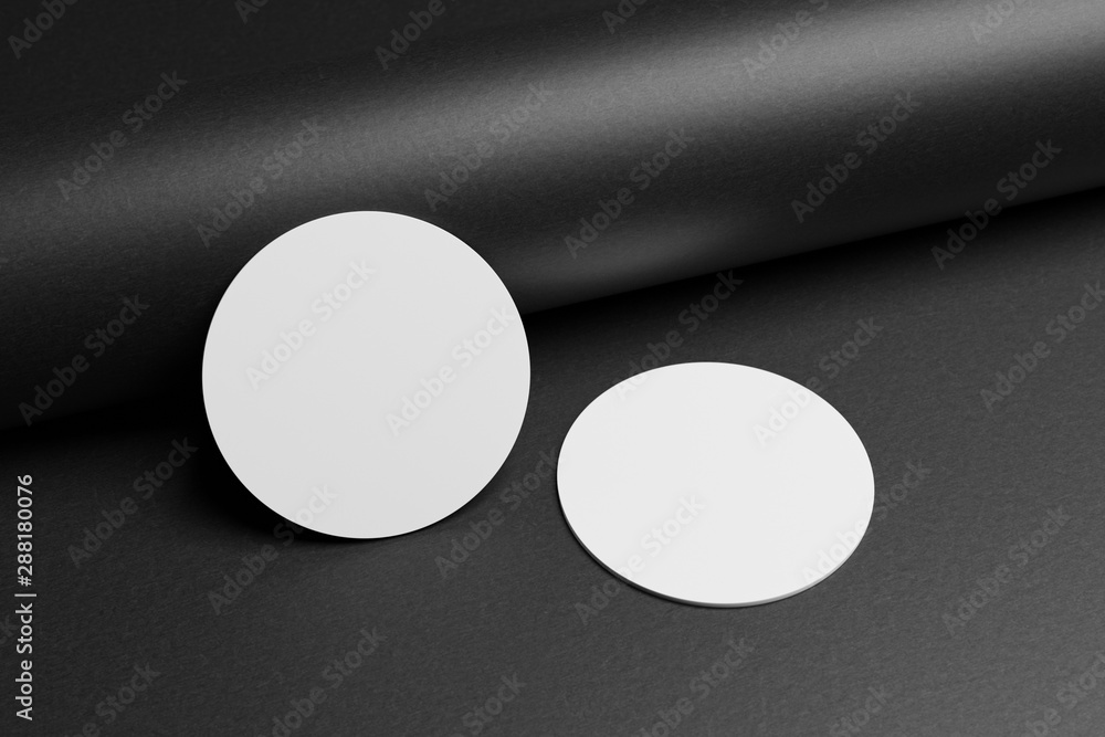 3D render Mock-up of the two round business cards are on a black paper 3D render Mock-up of the two round business cards are on a black paper