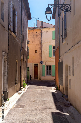 Fototapeta Naklejka Na Ścianę i Meble -  Arles. Old narrow street in the historic center of the city.