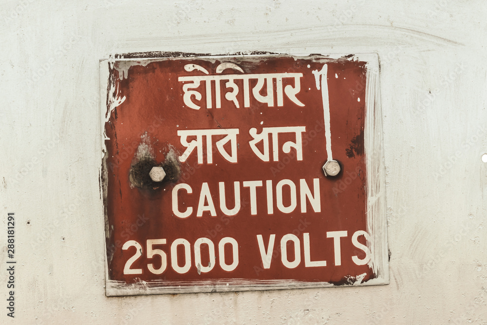 Caution 25000 high voltage safety warning sign in a clear and straight instructions to communicate at work with everyone for spreading awareness about a potential risk in workplace around the premises