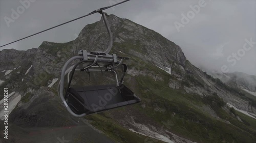 cableway in the resort of Rosa Khutor in Sochi rides in the clouds