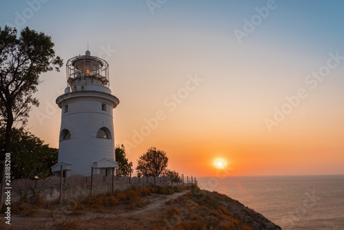White sea lighthouse in Feodosia  Crimea on the Black Sea from sunrise