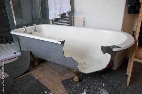 Broken cast iron bath