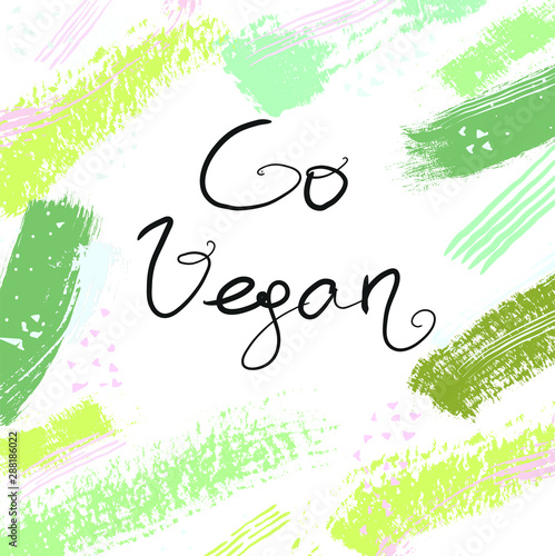 Go vegan. Inspirational quote for posters and cards. Handwritten calligraphy.  trendy text on watercolor background for apparel and print design