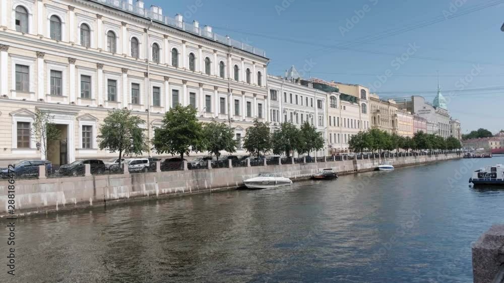 ST. PETERSBURG, RUSSIA - AUGUST 7, 2019: the Moyka River in St Petersburg, Russia ST. PETERSBURG, RUSSIA - AUGUST 7, 2019: the Moyka River in St Petersburg, Russia