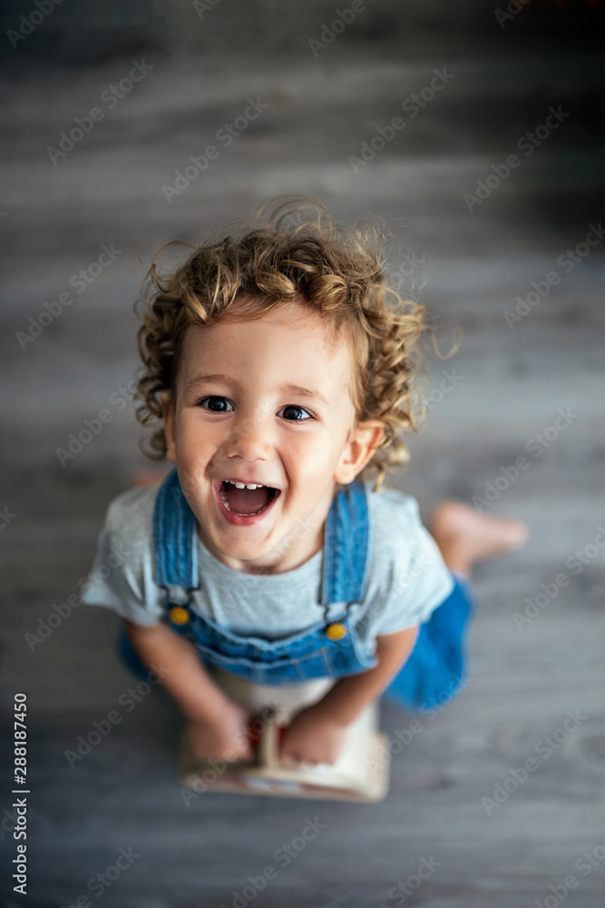 Portrait of cute child looking at the camera Portrait of cute child looking at the camera