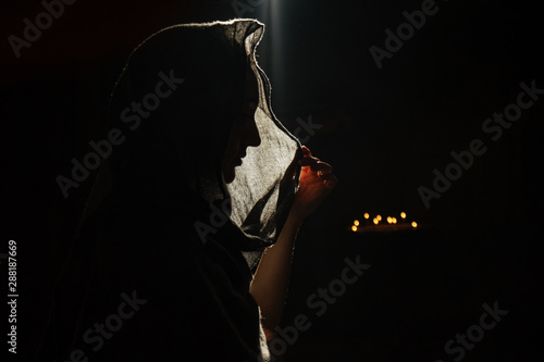 Silhouette of woman in veil photo