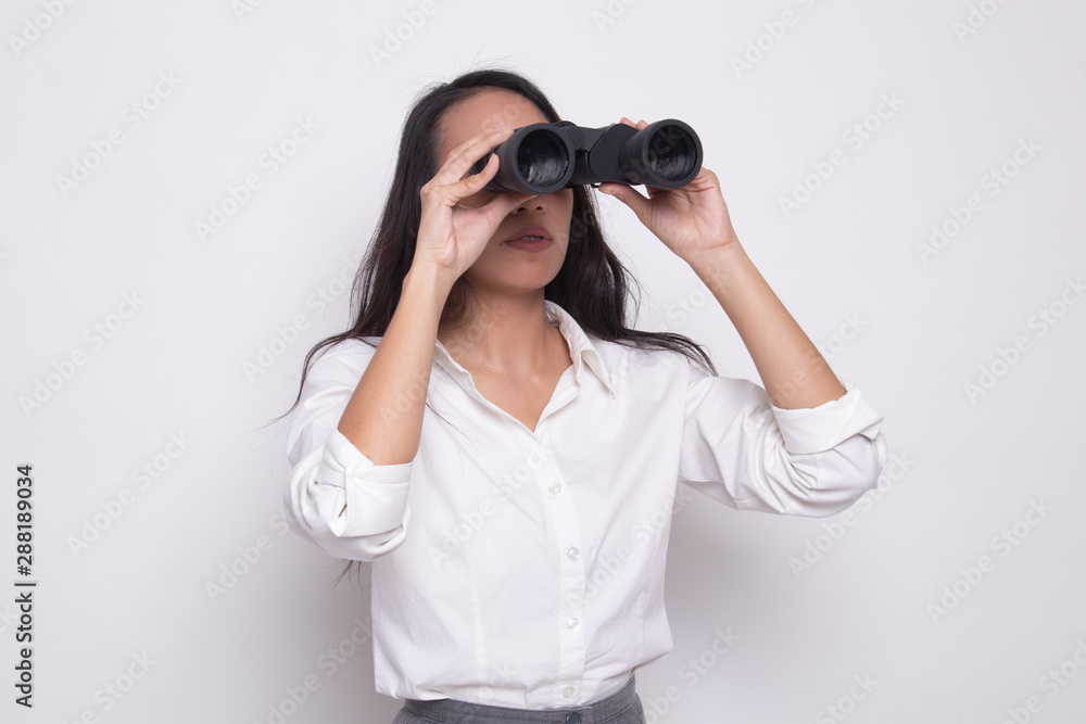 Young Asian woman with binoculars. Young Asian woman with binoculars.