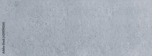 Panoramic grunge stone texture background. Grey vintage dirty abstract wall.