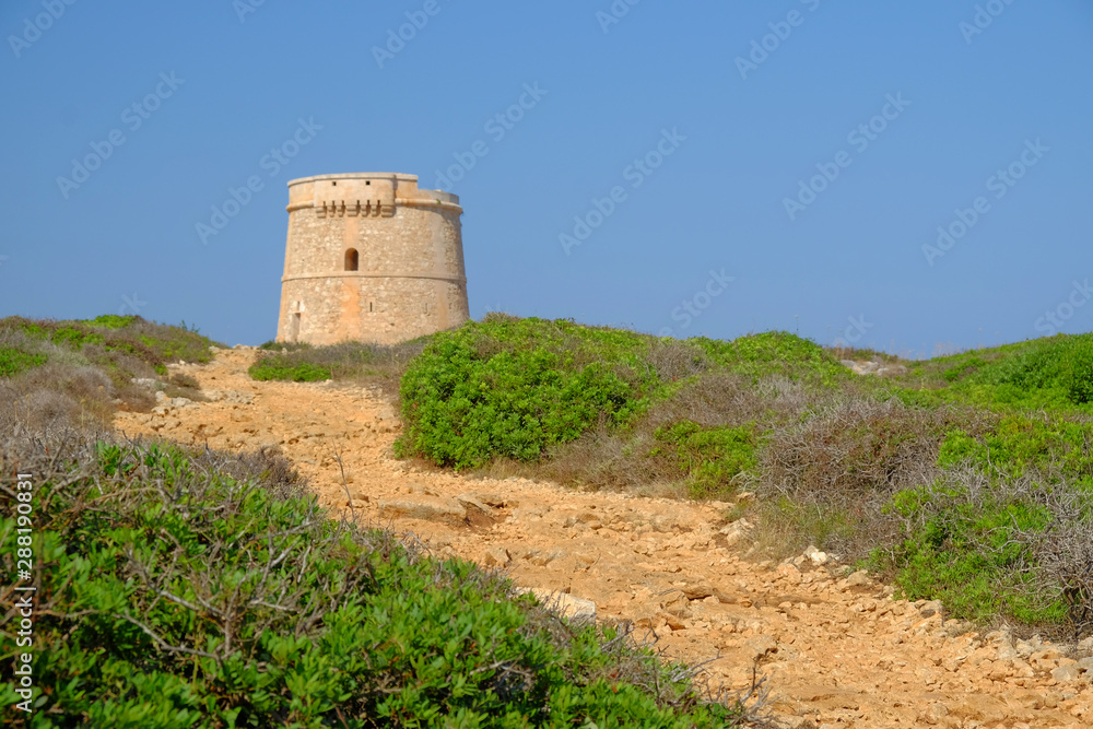 Landscape with Defense Tower Alcaufar - Torre de Defensa de Alcaufar on Menorca.