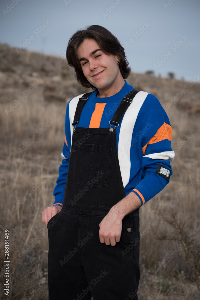 YOUNG MAN WITH STRIPED JERSEY