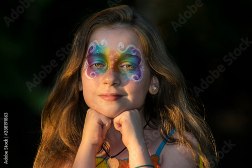 Girl in Rainbow Face Paint