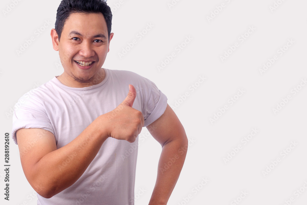 Young Man Showing Thumbs Up Gesture OK Sign Young Man Showing Thumbs Up Gesture OK Sign