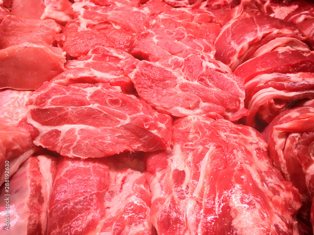 Steaks from beef and pork red meat in market Steaks from beef and pork red meat in market