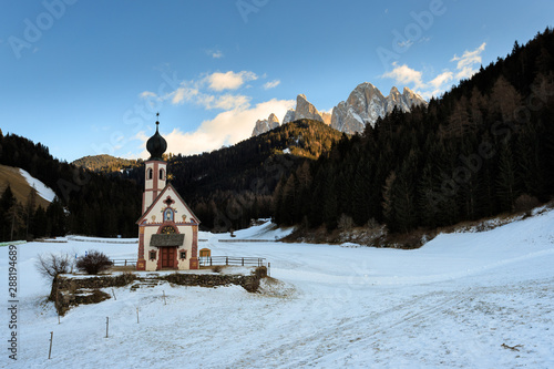 chiesetta di San Giovanni in Ranui, in val di Funes. Sullo sfondo le Odle  photo