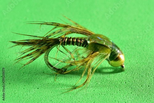 Copper John trout fly imitation photo